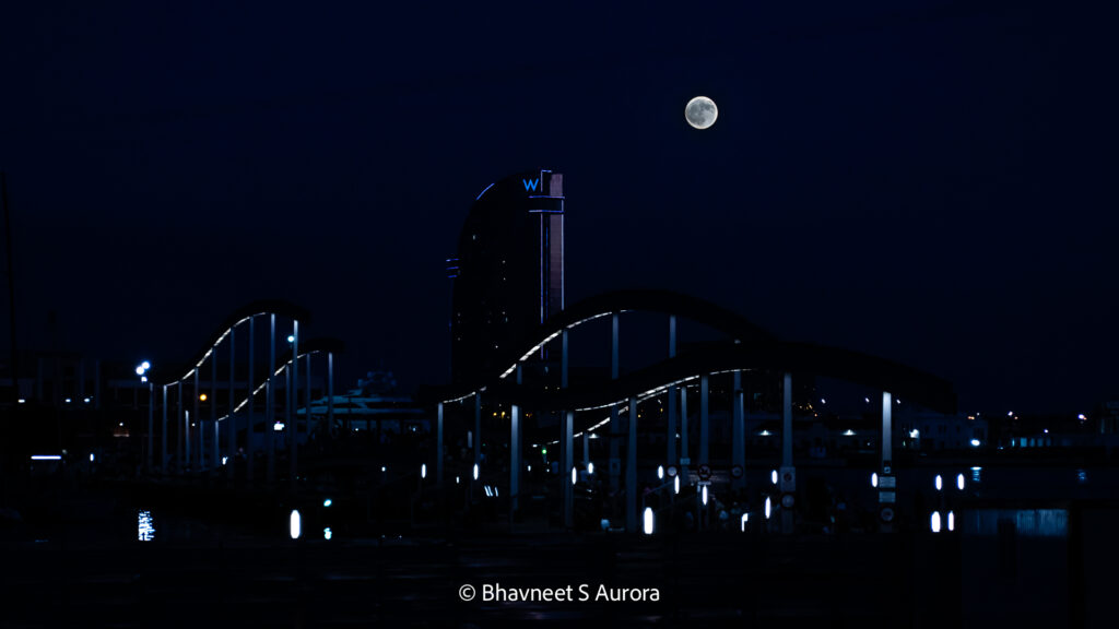 Moon Rise over the wooden footbridge at Port Vell, Barcelona, Spain
